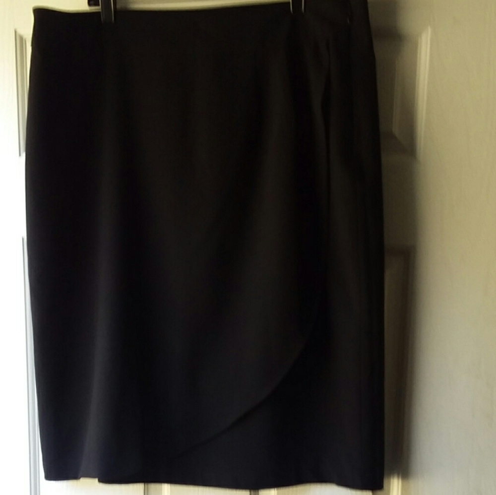 Kim Rogers,  black skirt.